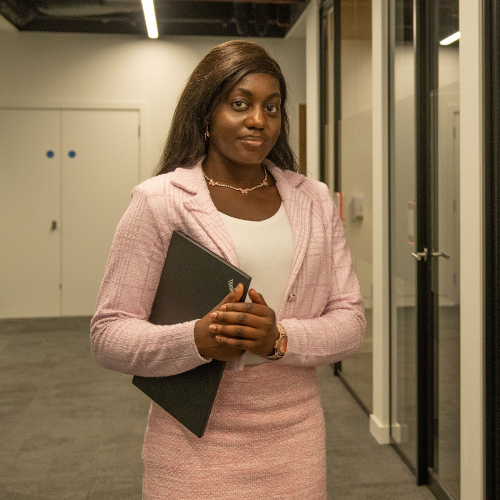 <b>Faidah Oki<br/>BT Group</b><br/><br/>Degree apprentice at BT, Faidah works across tech and customer-facing teams, currently supporting unified communications design. She leads PowerApps training and helped grow the Black Apprentice Network. Her outreach and TikTok content inspire young women in tech.